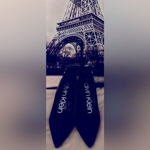 New Calvin Klein pumps size 6 with 3 in heels & faux snake skin. Logo on side